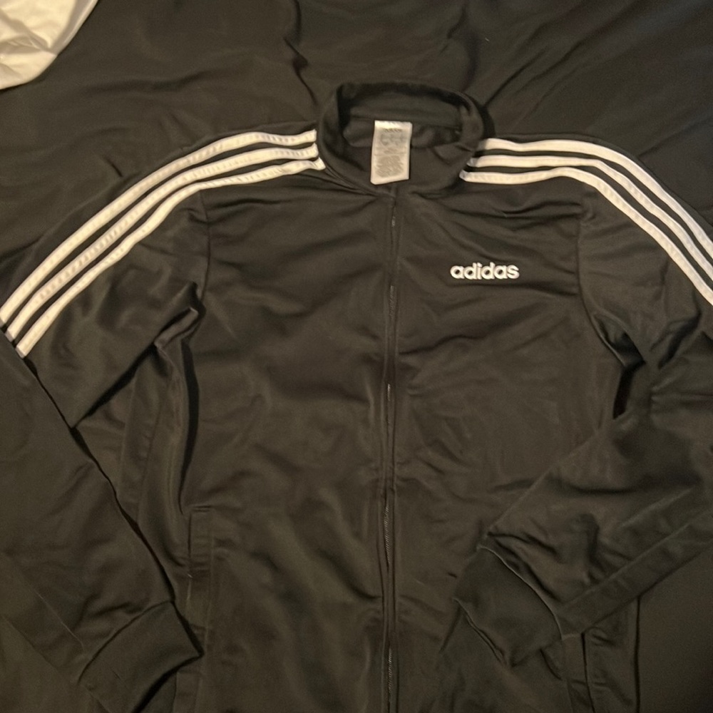 Black white stripe Addis’s black zip up jacket